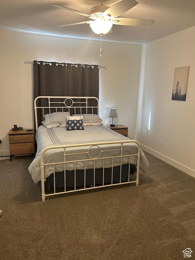 133 E Sailors Way, Garden City, UT 84028 - carpeted bedroom with baseboards and a ceiling fan
