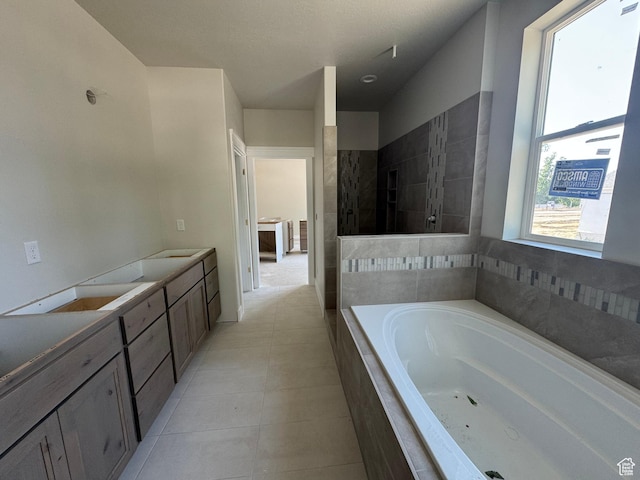 21 N 100 W Unit 3, Farmington, UT 84025 - bathroom with a garden tub, tile patterned floors, double vanity, and a tile shower