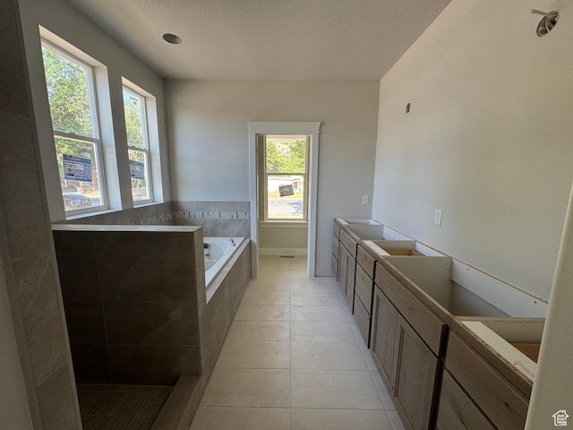 21 N 100 W Unit 3, Farmington, UT 84025 - full bath featuring a garden tub, tile patterned floors, a textured ceiling, and double vanity