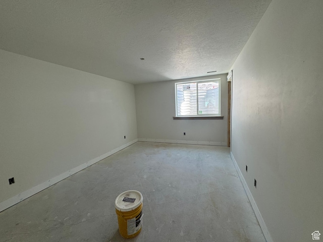 21 N 100 W Unit 3, Farmington, UT 84025 - empty room featuring unfinished concrete flooring and a textured ceiling