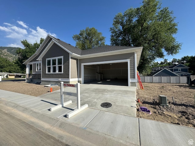 21 N 100 W Unit 3, Farmington, UT 84025 - view of front of house with concrete driveway and a garage