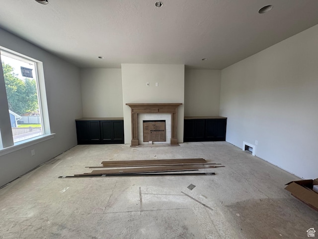 21 N 100 W Unit 3, Farmington, UT 84025 - unfurnished living room featuring a fireplace with flush hearth