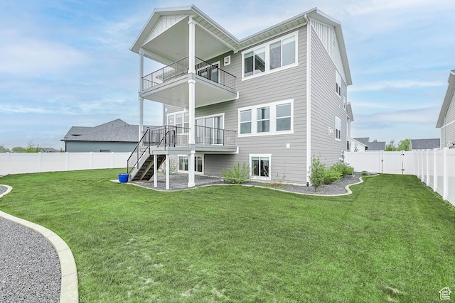 3932 W 2875 N, Plain City, UT 84404 - back of property featuring a balcony, stairway, a wooden deck, and a gate