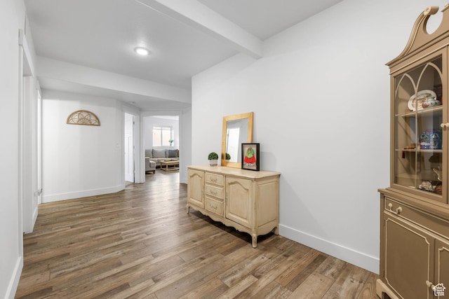 3932 W 2875 N, Plain City, UT 84404 - hallway with light wood-style flooring, beamed ceiling, and baseboards
