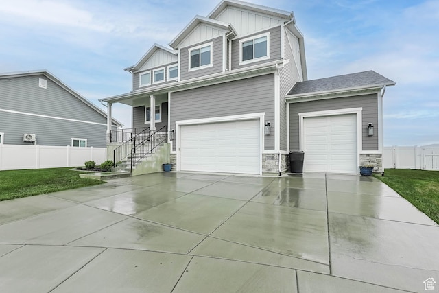3932 W 2875 N, Plain City, UT 84404 - craftsman inspired home featuring board and batten siding, driveway, stone siding, a garage, and a porch