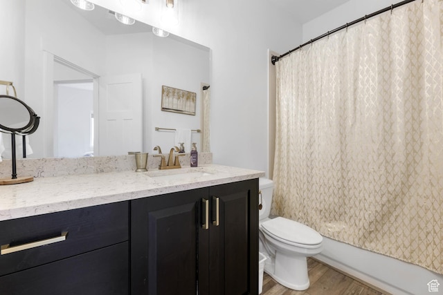 3932 W 2875 N, Plain City, UT 84404 - full bath with wood finished floors, toilet, vanity, and shower / bath combo
