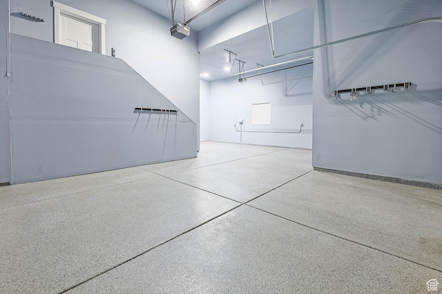 3932 W 2875 N, Plain City, UT 84404 - garage featuring a garage door opener