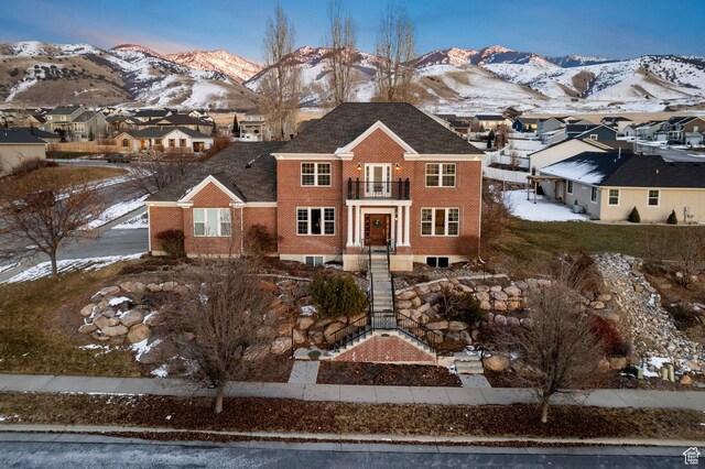 434 S Cardon Ridge Dr, Smithfield, UT 84335 - view of front of house with a balcony, a mountain view, and a residential view