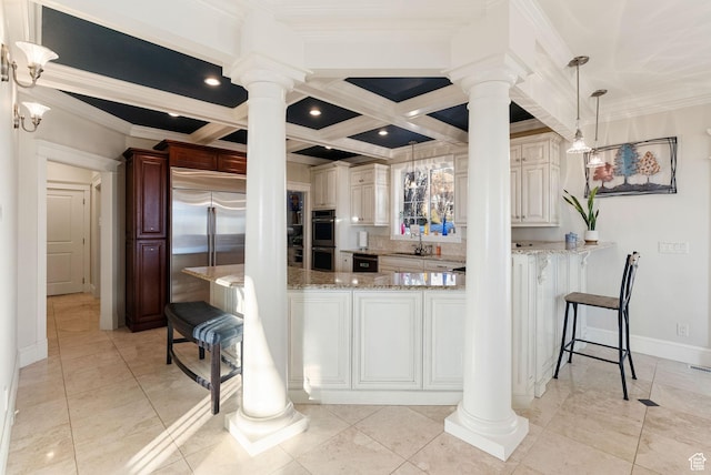 434 S Cardon Ridge Dr, Smithfield, UT 84335 - kitchen featuring ornate columns, appliances with stainless steel finishes, coffered ceiling, a breakfast bar area, and crown molding