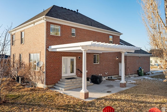 434 S Cardon Ridge Dr, Smithfield, UT 84335 - rear view of property with brick siding, a pergola, french doors, a patio area, and a shingled roof