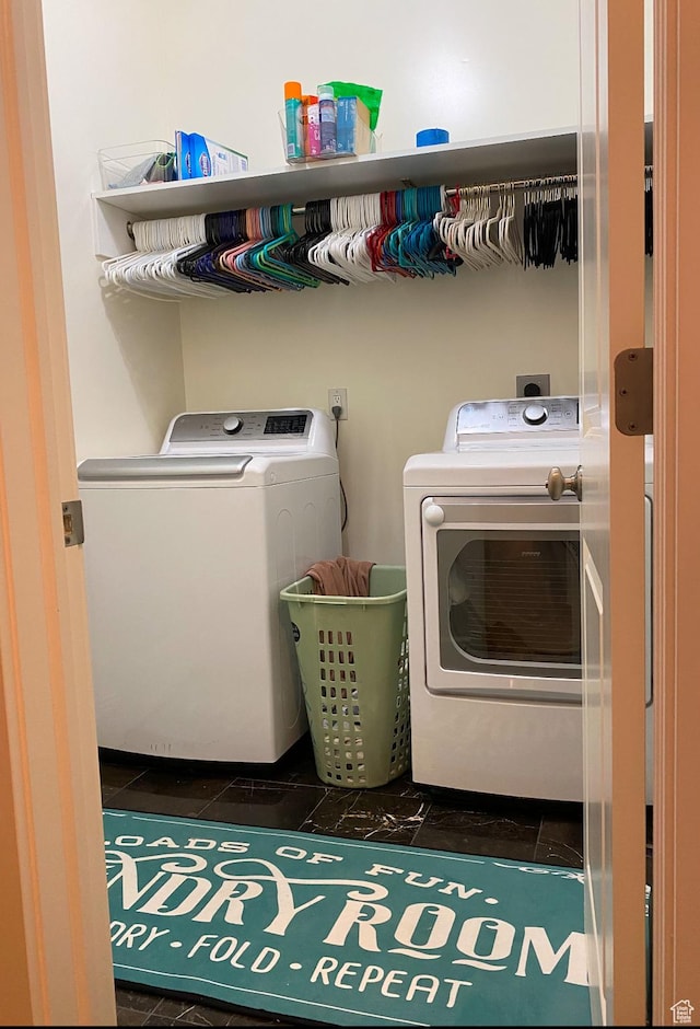 434 S Cardon Ridge Dr, Smithfield, UT 84335 - laundry area with separate washer and dryer and dark tile patterned floors