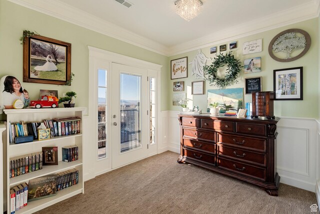 434 S Cardon Ridge Dr, Smithfield, UT 84335 - sitting room featuring carpet, crown molding, a wainscoted wall, and a decorative wall
