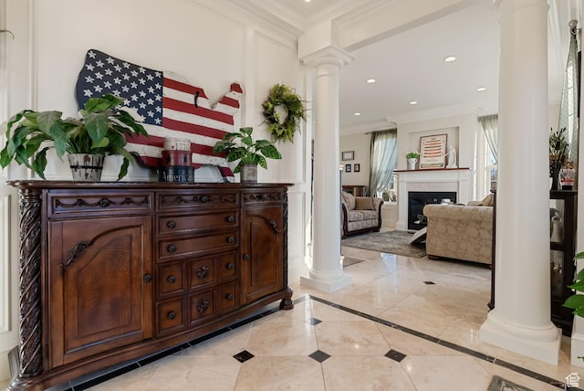 434 S Cardon Ridge Dr, Smithfield, UT 84335 - foyer featuring decorative columns, crown molding, recessed lighting, inlaid floor details, and a fireplace