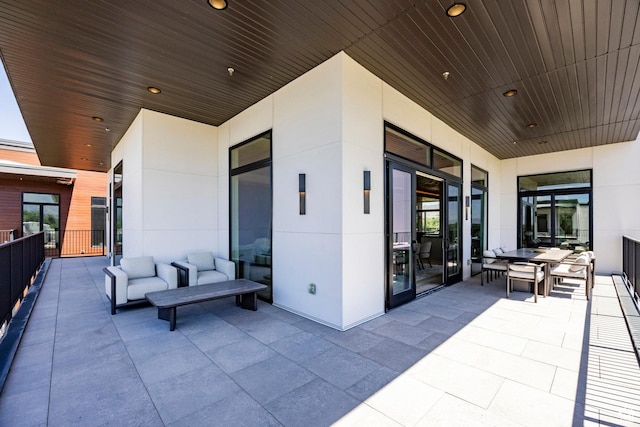 1920 E Rodeo Walk Dr Unit 516, Holladay, UT 84117 - view of patio featuring an outdoor hangout area and outdoor dining area