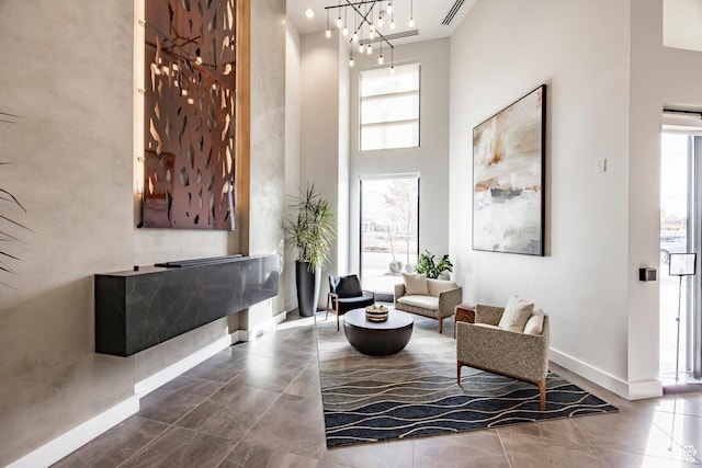 1920 E Rodeo Walk Dr Unit 516, Holladay, UT 84117 - foyer with a towering ceiling, plenty of natural light, and baseboards