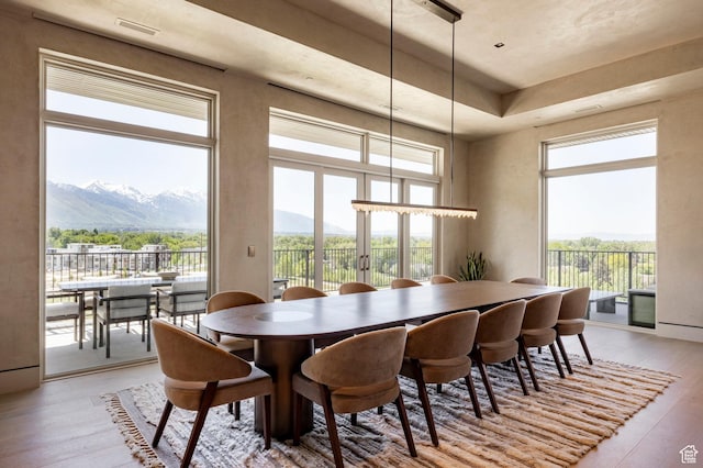 1920 E Rodeo Walk Dr Unit 516, Holladay, UT 84117 - dining area with a mountain view and light wood-style floors