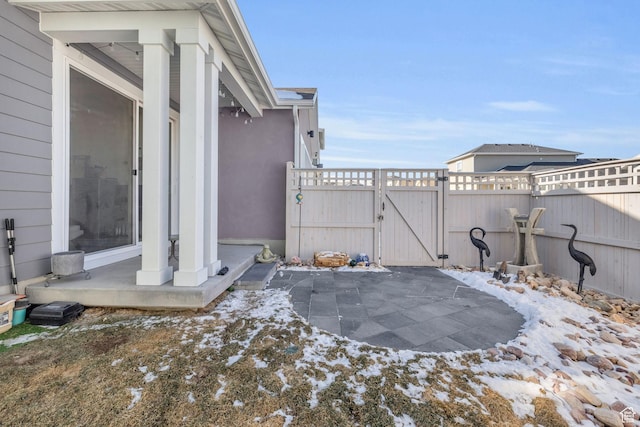 view of snow covered patio