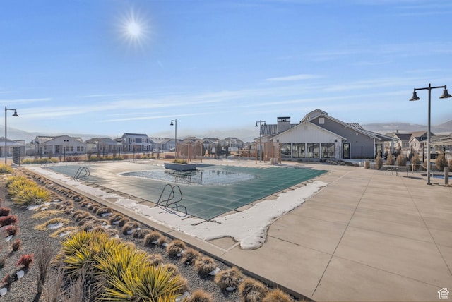view of pool featuring a patio