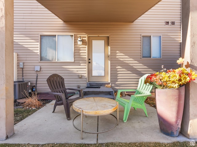 view of patio featuring cooling unit