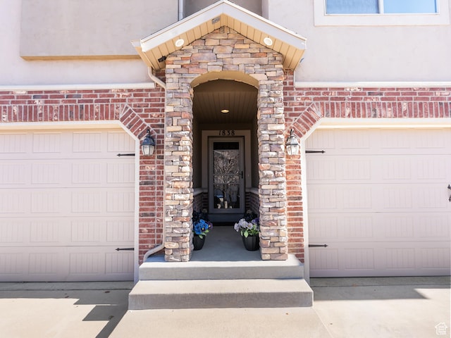 property entrance with a garage