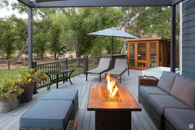 424 E Secret Cove Ct, Moab, UT 84532 - wooden terrace featuring an outdoor living space with a fire pit