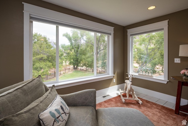 424 E Secret Cove Ct, Moab, UT 84532 - sitting room featuring carpet floors, visible vents, and plenty of natural light