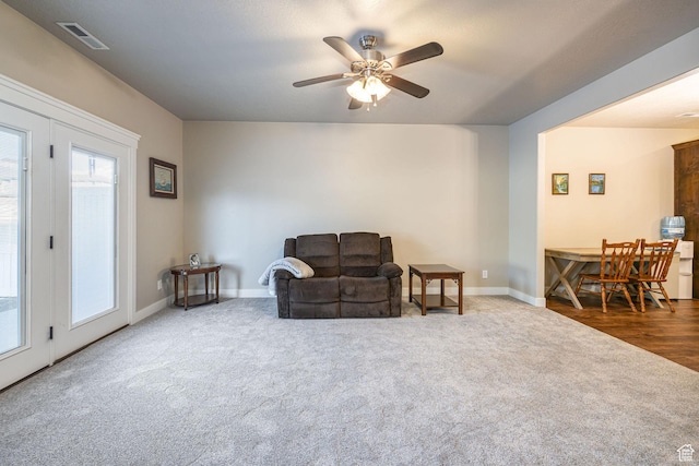 644 E 50 S, Hyrum, UT 84319 - living area with carpet flooring, ceiling fan, and baseboards