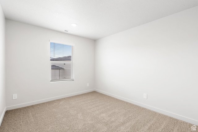 3141 W 3500 S Unit 113, West Haven, UT 84401 - empty room featuring carpet floors and baseboards