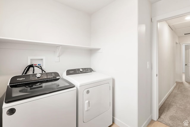 3141 W 3500 S Unit 113, West Haven, UT 84401 - washroom featuring separate washer and dryer, laundry area, and baseboards