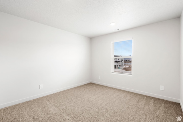3141 W 3500 S Unit 113, West Haven, UT 84401 - empty room featuring baseboards and light carpet