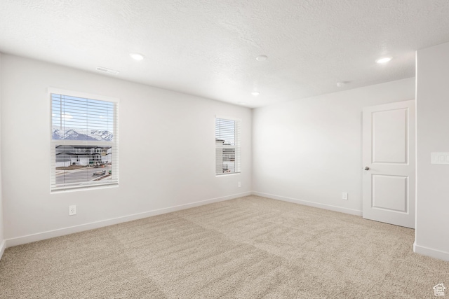 3141 W 3500 S Unit 113, West Haven, UT 84401 - empty room with baseboards, light carpet, and recessed lighting