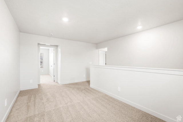 3141 W 3500 S Unit 113, West Haven, UT 84401 - unfurnished room featuring light colored carpet, recessed lighting, and baseboards