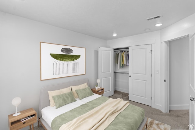 carpeted bedroom with a closet