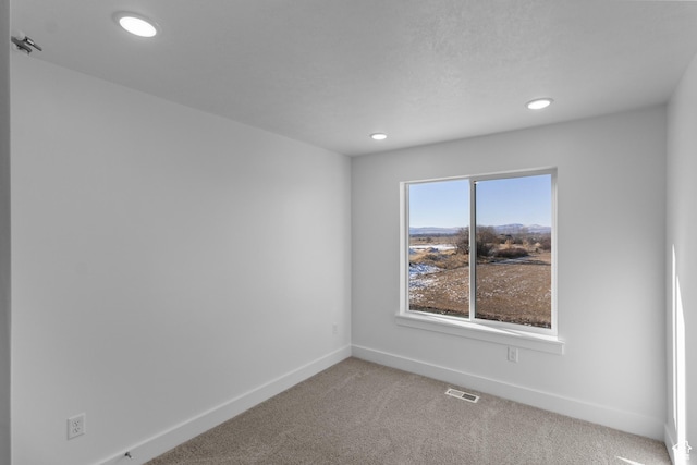 view of carpeted empty room