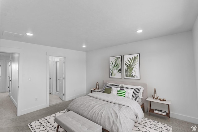 bedroom with light carpet