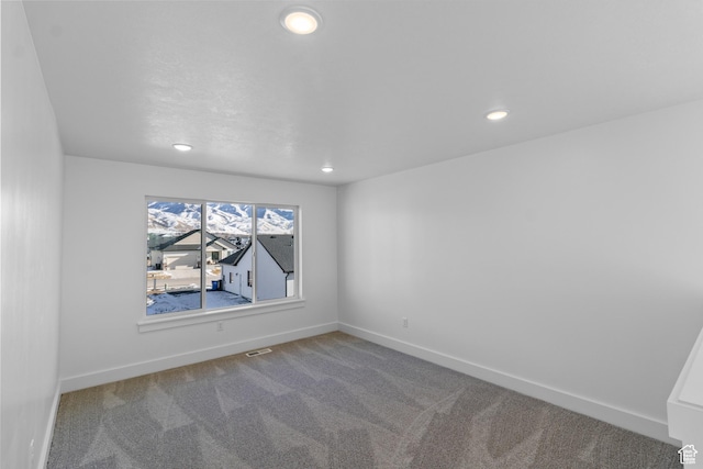 view of carpeted spare room