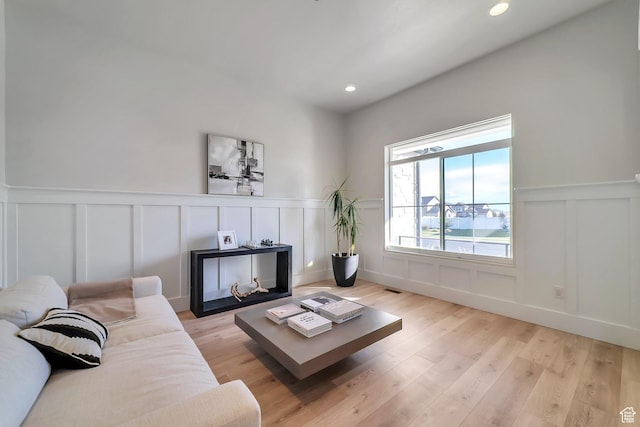 1521 E Thorpe Dr, Eagle Mountain, UT 84005 - living room with recessed lighting, a decorative wall, light wood-style flooring, and visible vents