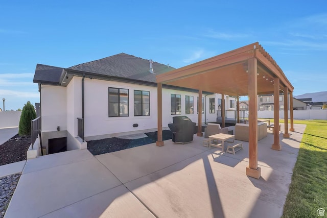 1521 E Thorpe Dr, Eagle Mountain, UT 84005 - back of house featuring stucco siding, an outdoor living space, fence, a shingled roof, and a patio area
