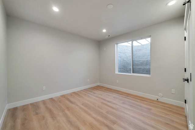 1521 E Thorpe Dr, Eagle Mountain, UT 84005 - empty room with recessed lighting, light wood-style flooring, visible vents, and baseboards