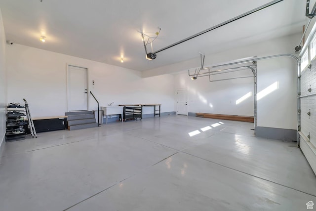 1521 E Thorpe Dr, Eagle Mountain, UT 84005 - garage with a garage door opener and a sink