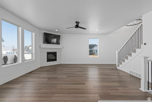 1504 S Lukas Ln, Saratoga Springs, UT 84045 - unfurnished living room featuring dark hardwood / wood-style floors and ceiling fan