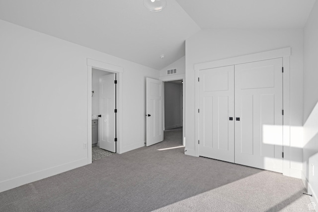 1504 S Lukas Ln, Saratoga Springs, UT 84045 - unfurnished bedroom featuring vaulted ceiling, light carpet, ensuite bathroom, and a closet