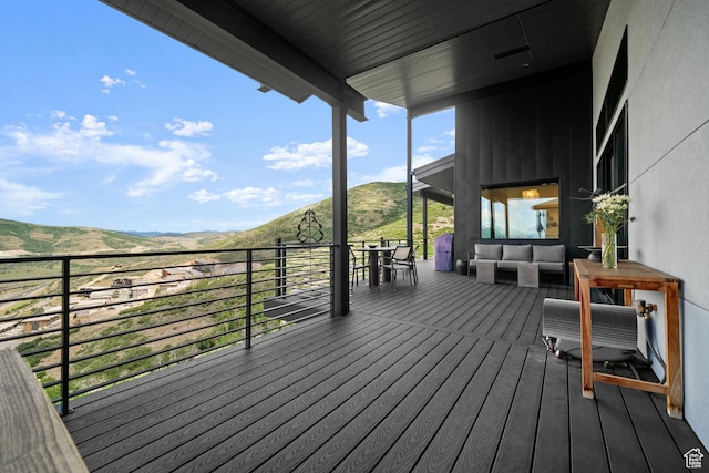 11515 N White Tail Ct, Hideout, UT 84036 - wooden deck featuring outdoor lounge area and a mountain view