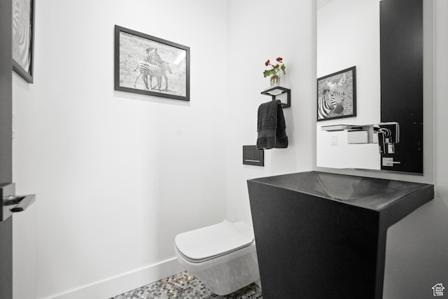 11515 N White Tail Ct, Hideout, UT 84036 - bathroom with toilet and baseboards