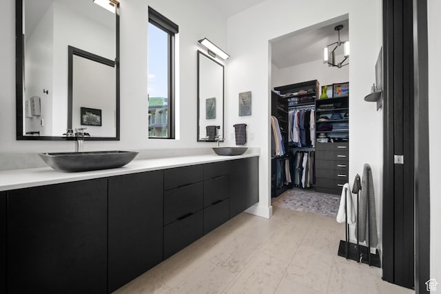 11515 N White Tail Ct, Hideout, UT 84036 - full bath featuring a spacious closet, double vanity, and a sink