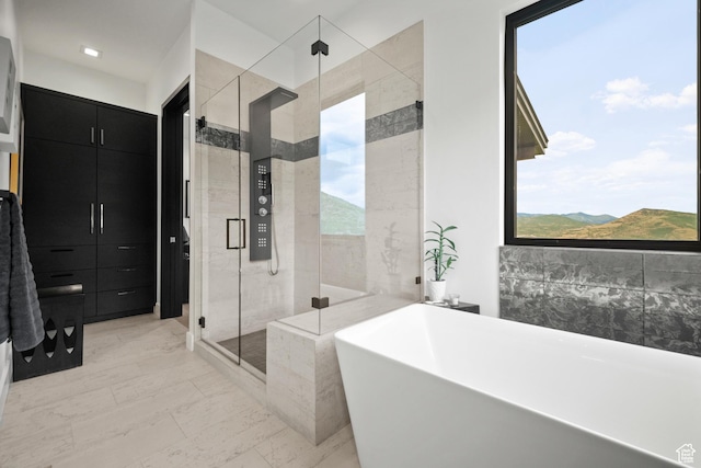 11515 N White Tail Ct, Hideout, UT 84036 - full bath with a freestanding tub and a stall shower
