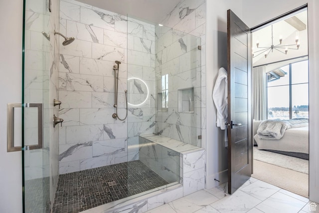 149 N Haystack Mountain Dr, Heber City, UT 84032 - ensuite bathroom with a chandelier, a marble finish shower, and marble look tile flooring