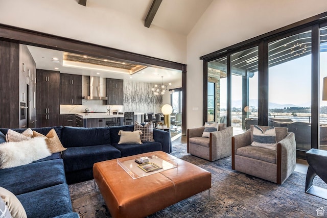 149 N Haystack Mountain Dr, Heber City, UT 84032 - living area with a chandelier, a mountain view, beam ceiling, and high vaulted ceiling