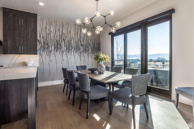149 N Haystack Mountain Dr, Heber City, UT 84032 - dining space featuring dark wood-style flooring, a chandelier, a mountain view, baseboards, and recessed lighting