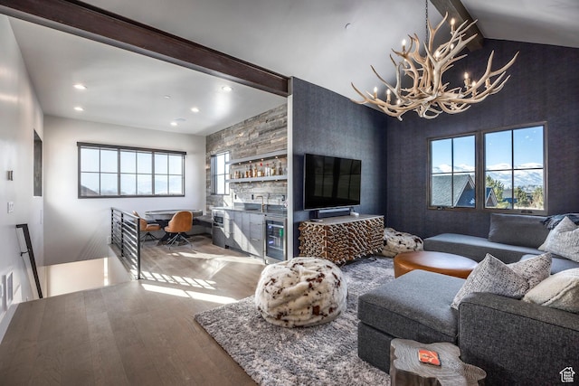 149 N Haystack Mountain Dr, Heber City, UT 84032 - living area featuring beverage cooler, wood finished floors, a chandelier, recessed lighting, and a dry bar